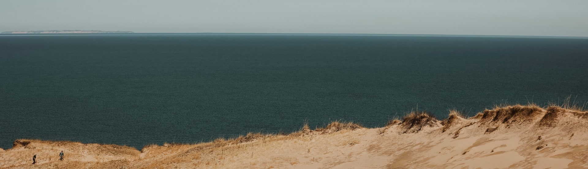 Sand Dunes by a lake.